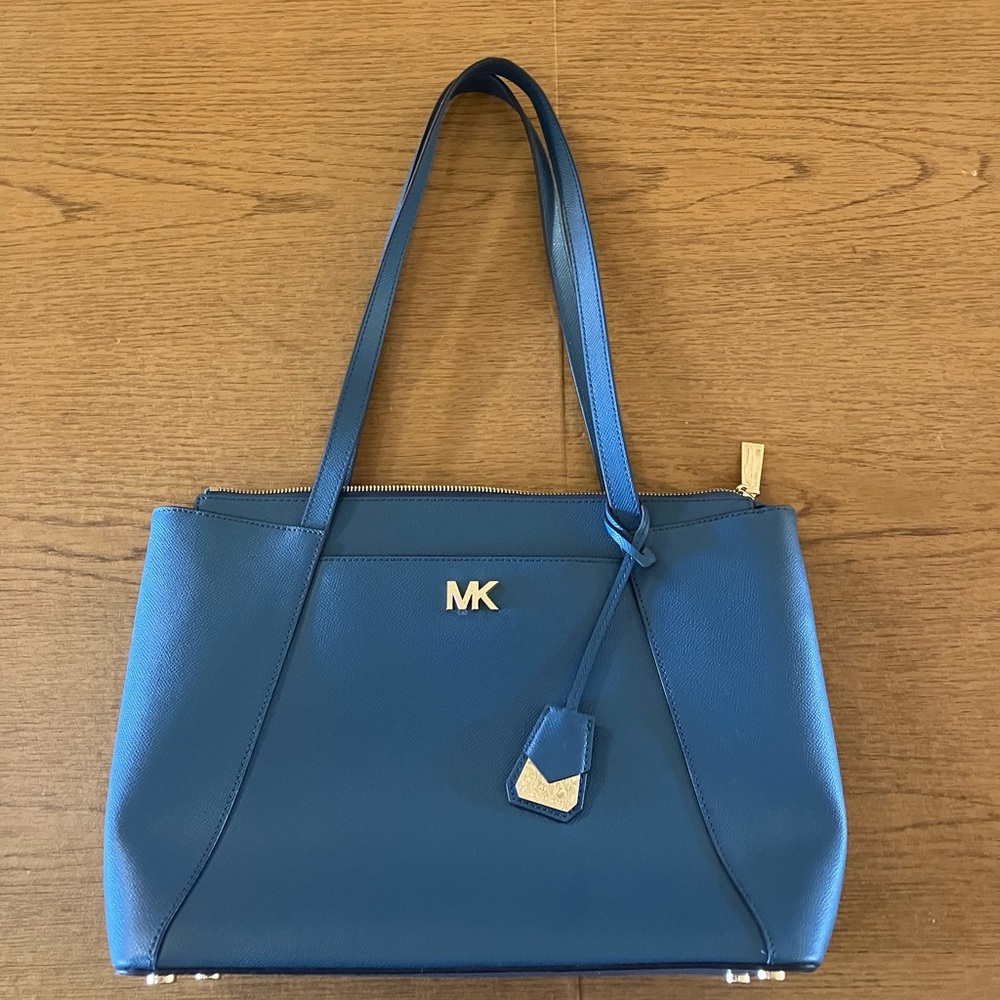 Michael Kors teal purse; saffiano leather; zipper close; 2 exterior pockets